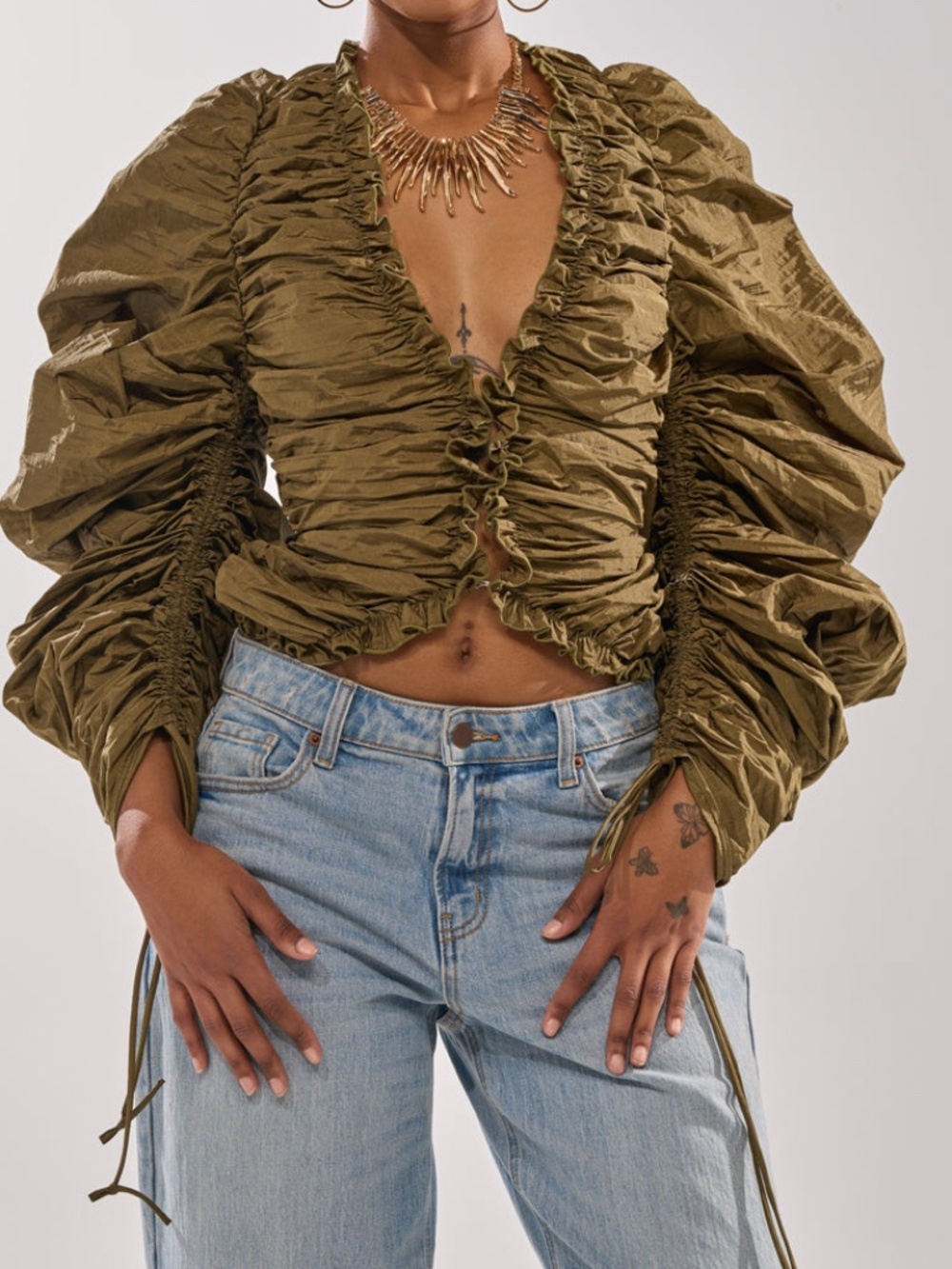 AKIRA IN IT TO WIN IT RUCHED BLOUSE